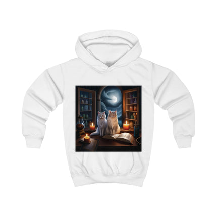Kids hoodie with moonlit witchy library graphic featuring two cats, candles, and an open book