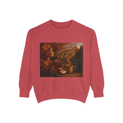 Unisex sweatshirt with AI image of a mug of cider, an autumn spirit, and text "Autumn speaks in the language of cider"