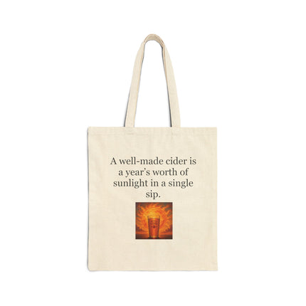 Canvas Tote Bag – “A well-made cider is a year’s worth of sunlight in a single sip” Quote Tote (Rustic Cider Design)
