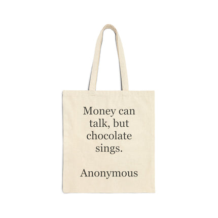 Cotton canvas tote bag with the printed quote “Money can talk, but chocolate sings.” in bold text