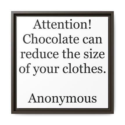 Framed matte canvas print with clean black serif typography reading “Attention! Chocolate can reduce the size of your clothes” on a crisp white background