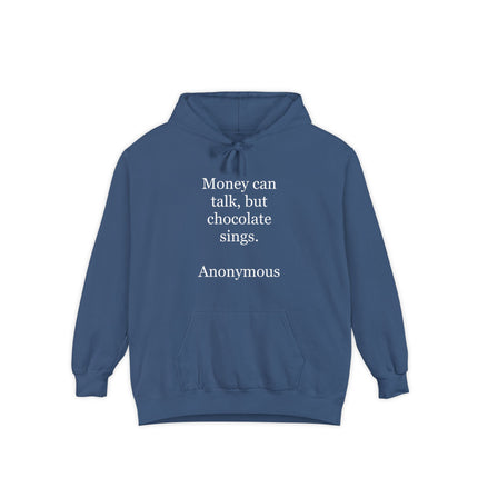 Garment‑dyed unisex hoodie with bold text reading “Money can talk, but chocolate sings.” printed on the front