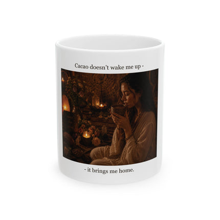White ceramic mug featuring a warm candlelit photo of a woman holding a steaming cacao cup  