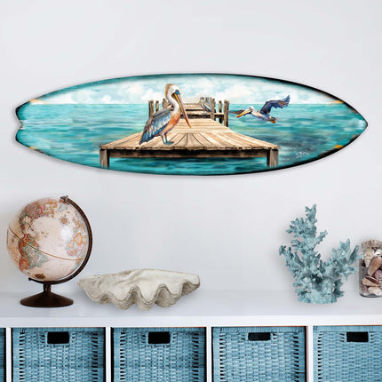 Pelican on the Pier Surfboard Coastal Wall Art by G. DeBrekht - Coastal Holiday Decor - 8490127HS-2