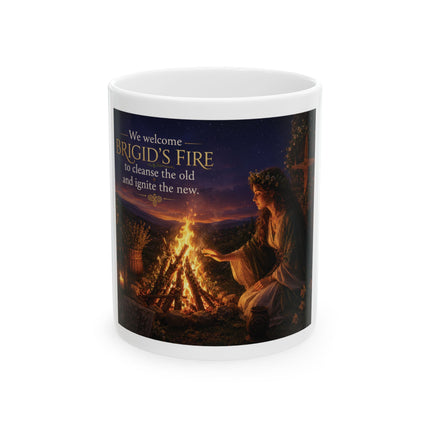 Glossy ceramic mug featuring an illustration of a woman tending a glowing Imbolc bonfire beneath a twilight sky