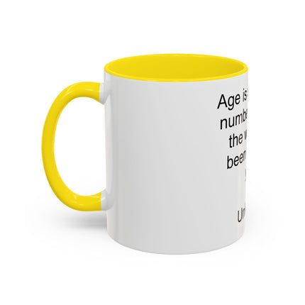 Accent Coffee Mug — "Age is simply the number of years the world has been enjoying you!" Inspirational Birthday Quote Mug