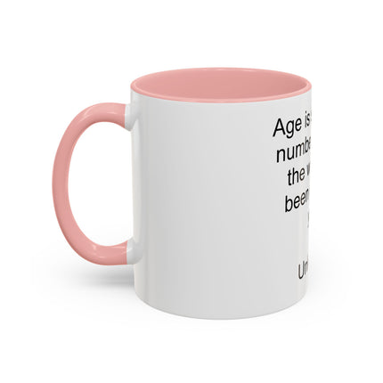Accent Coffee Mug — "Age is simply the number of years the world has been enjoying you!" Inspirational Birthday Quote Mug