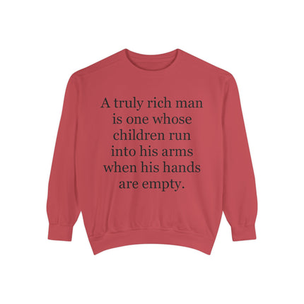 Quote Sweatshirt — "A truly rich man is one whose children run into his arms when his hands are empty."