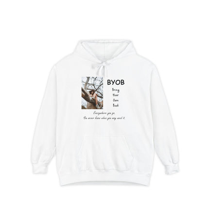 Garment‑dyed hoodie with an illustration of a reader perched in a tree and the text “B.Y.O.B. Bring Your Own Book”